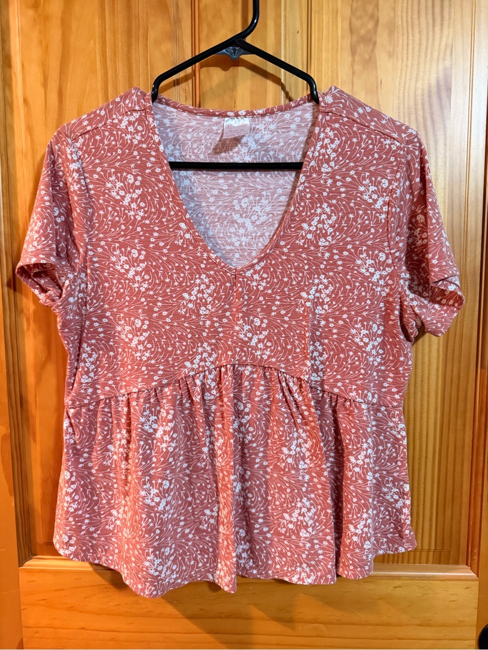 No Boundaries Coral V-Neck Peplum Top with White Floral Print
